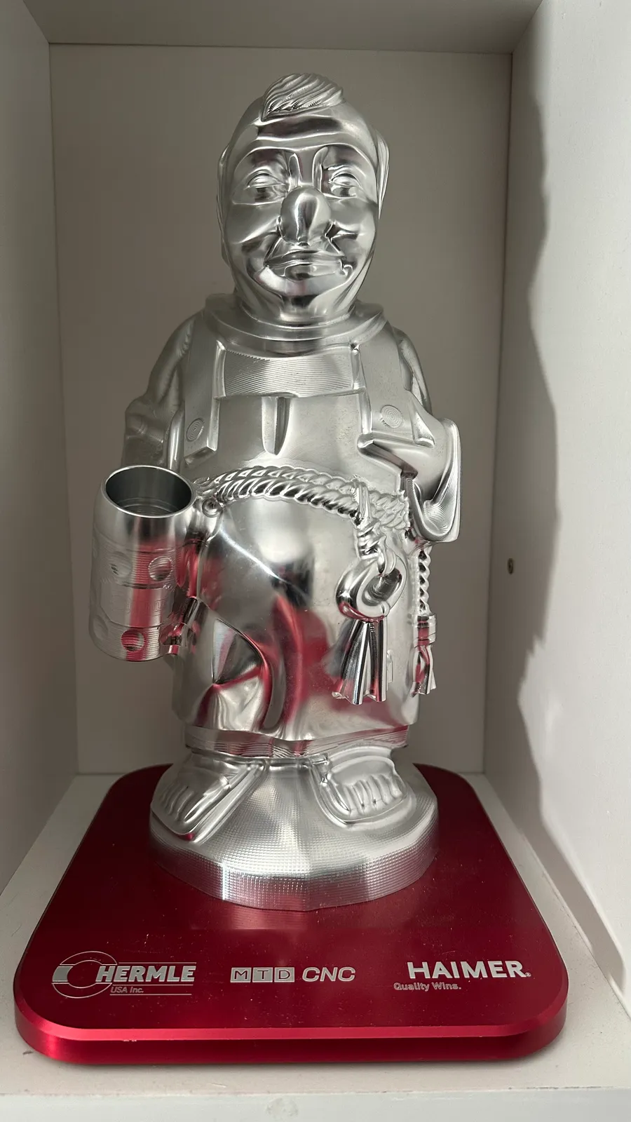 Polished aluminum helmet machined from solid billet, finish detail