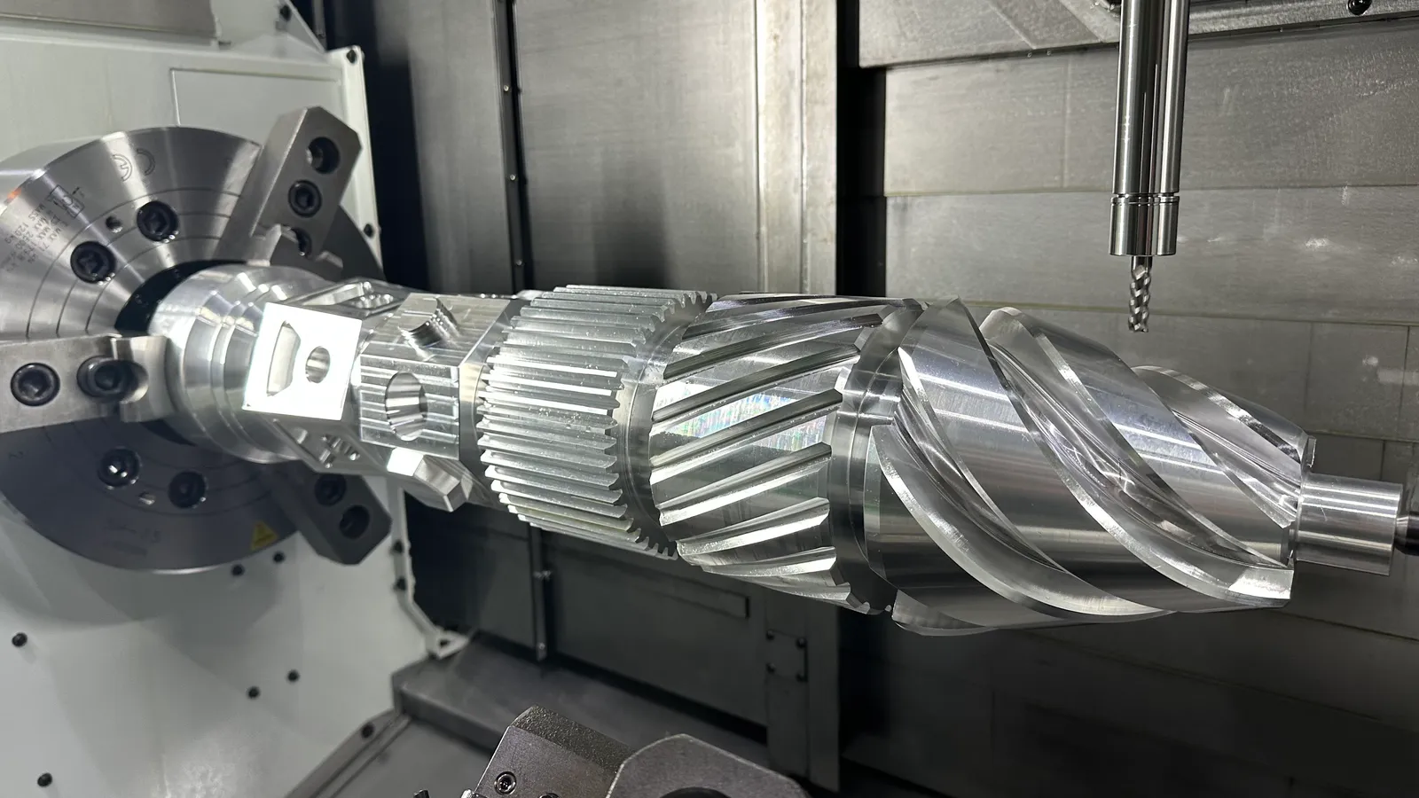 Machined screw shaft with precision helical geometry
